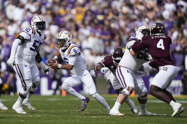 Jayden Daniels 4 TD passes lead No. 14 LSU past Texas A M 42 30